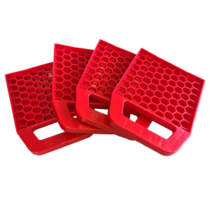 Redfoot Levelling - Four red plastic trays with handles on a white background.