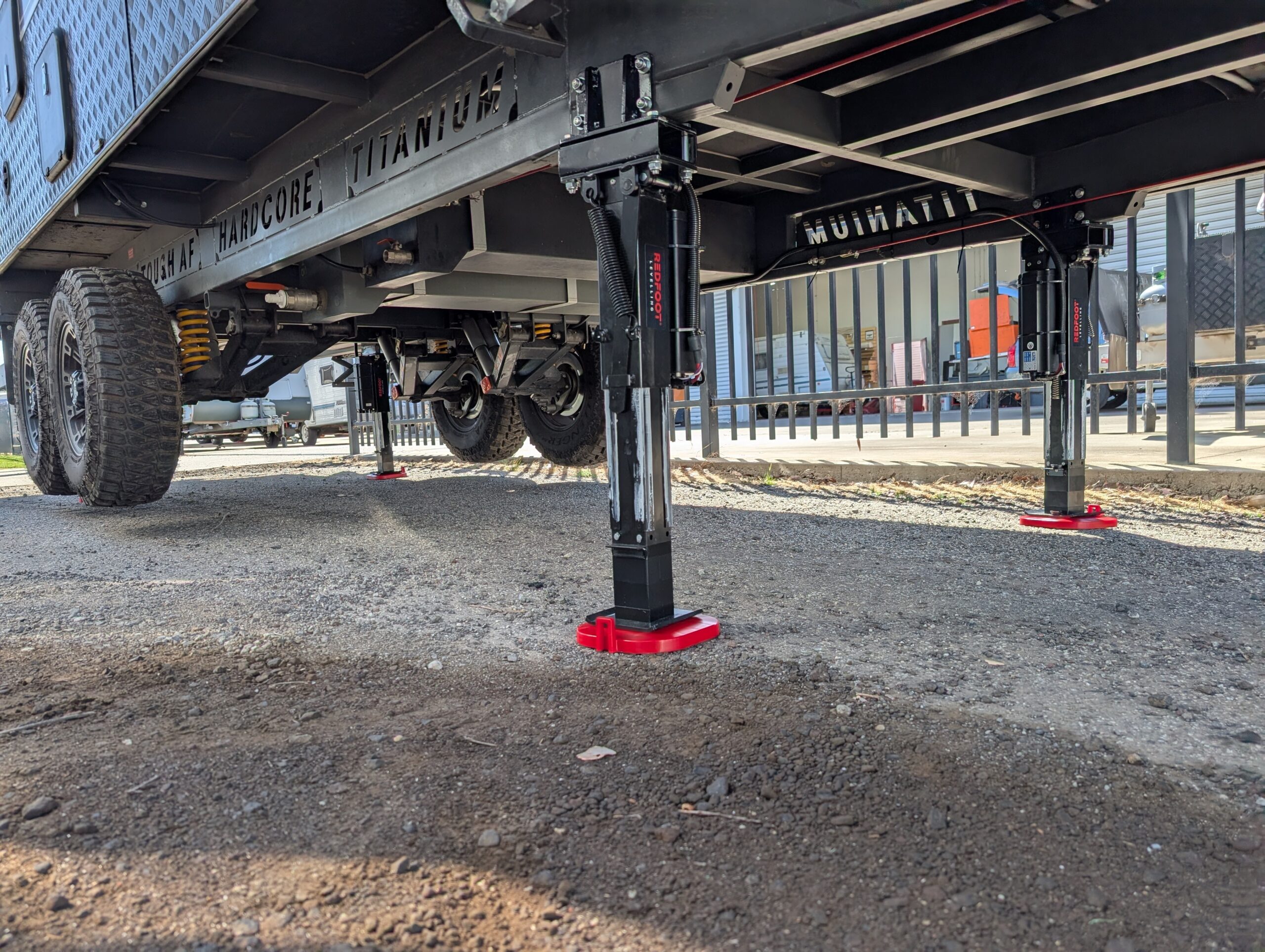 Caravan being levelled by AutoLift system